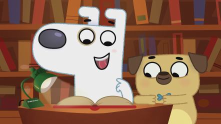A friendly, white dog and a beige pug reading a book with a large bookshelf behind them.