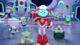 A friendly robot, in a red and white suit and a blue face, standing inside a spacecraft, surrounded by small and big robots.